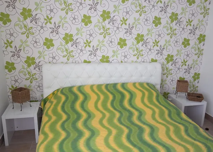 Toth - Benici 르티나